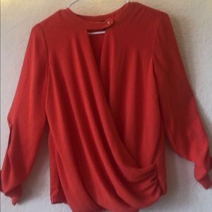a red elegant blouse